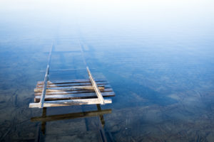 Rails sink into the cold lake Rails sink into the cold lake
